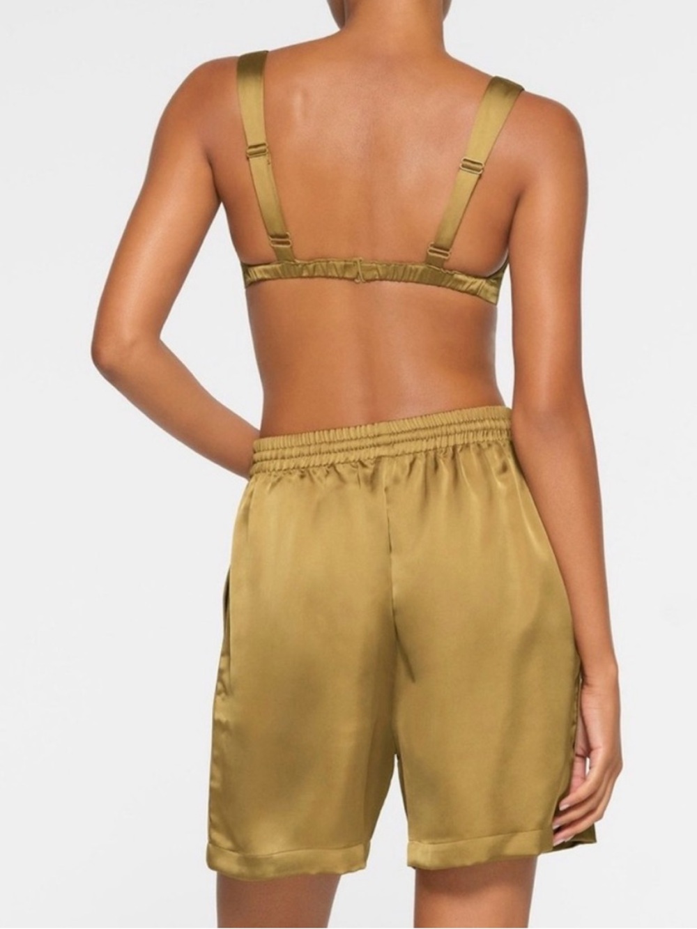 SKIMS Satin Athletic Shorts in Gold - Picture 4 of 6